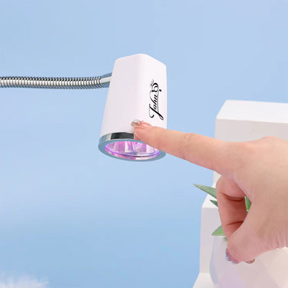 TOUCH SENSOR & RECHARGEABLE
FOCUSED BEAM LED NAIL LAMP