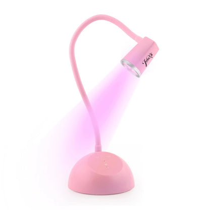 TOUCH SENSOR & RECHARGEABLE
FOCUSED BEAM LED NAIL LAMP