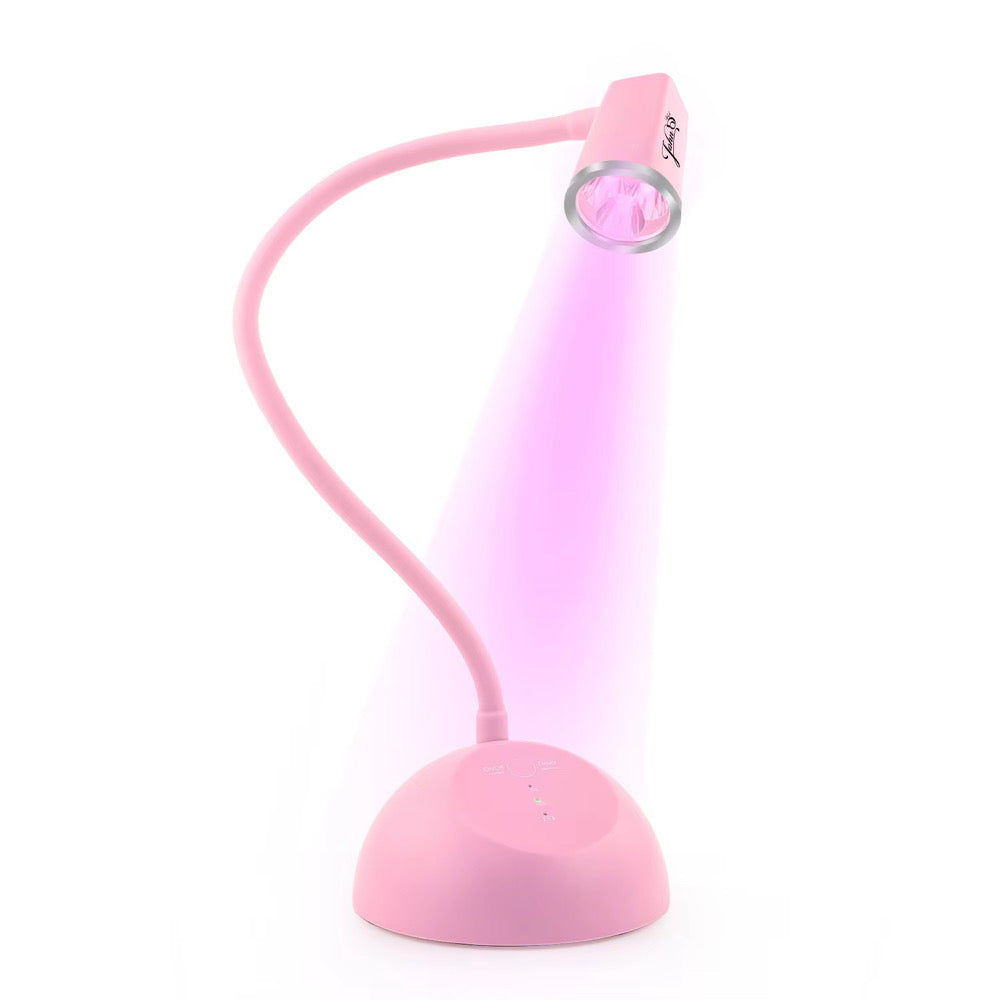 TOUCH SENSOR & RECHARGEABLE
FOCUSED BEAM LED NAIL LAMP