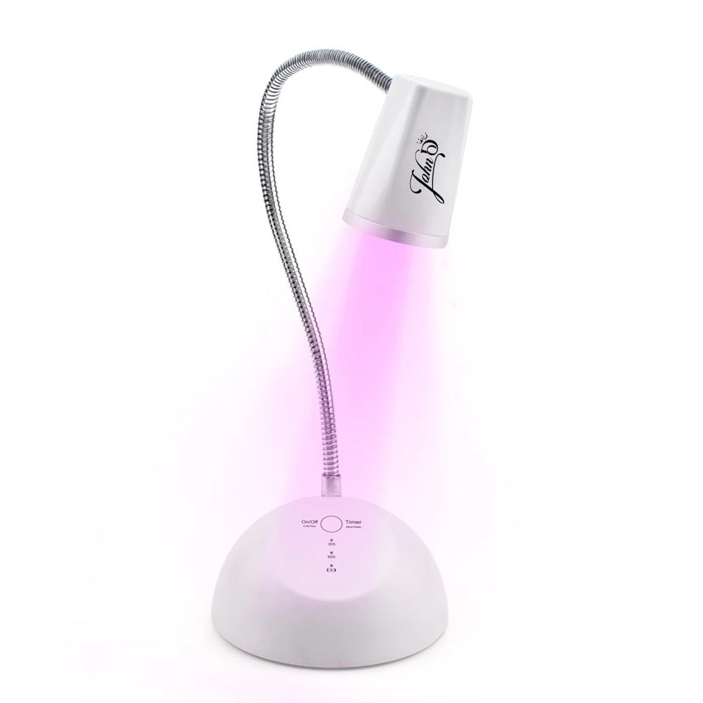 TOUCH SENSOR & RECHARGEABLE
FOCUSED BEAM LED NAIL LAMP